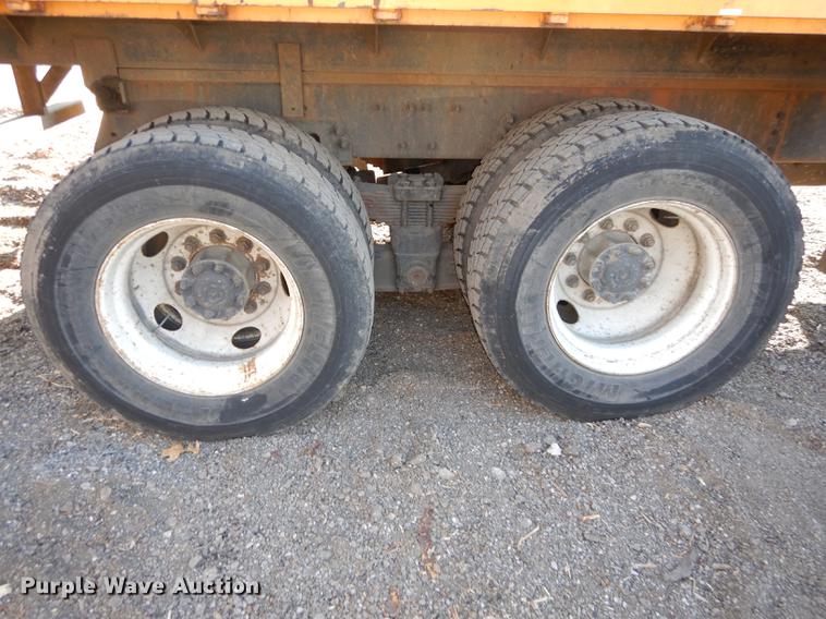 image for item J5564 2002 Sterling L8500 tree grapple truck