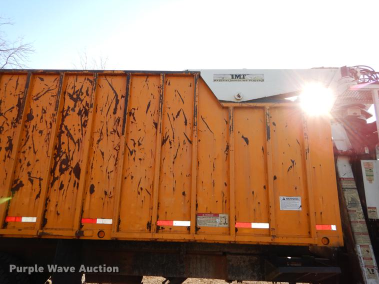 image for item J5564 2002 Sterling L8500 tree grapple truck