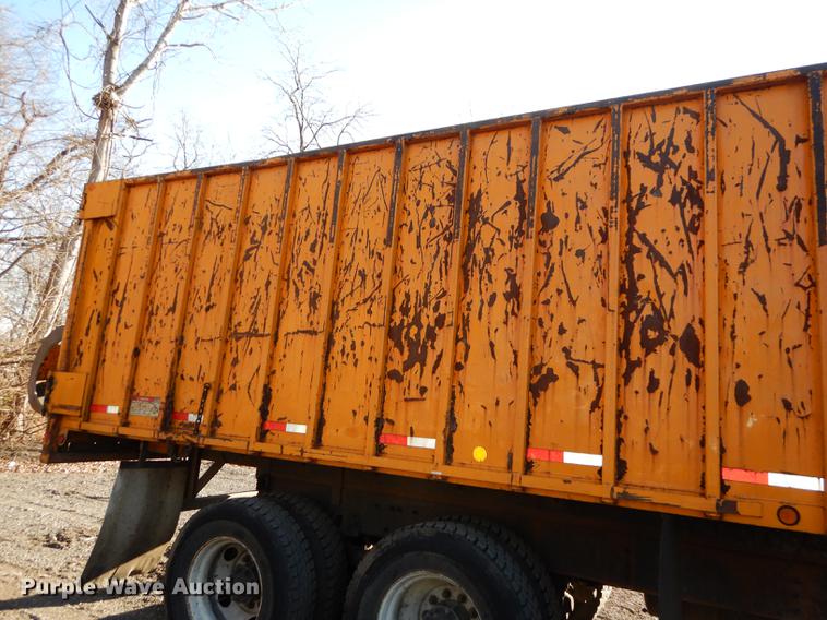 image for item J5564 2002 Sterling L8500 tree grapple truck