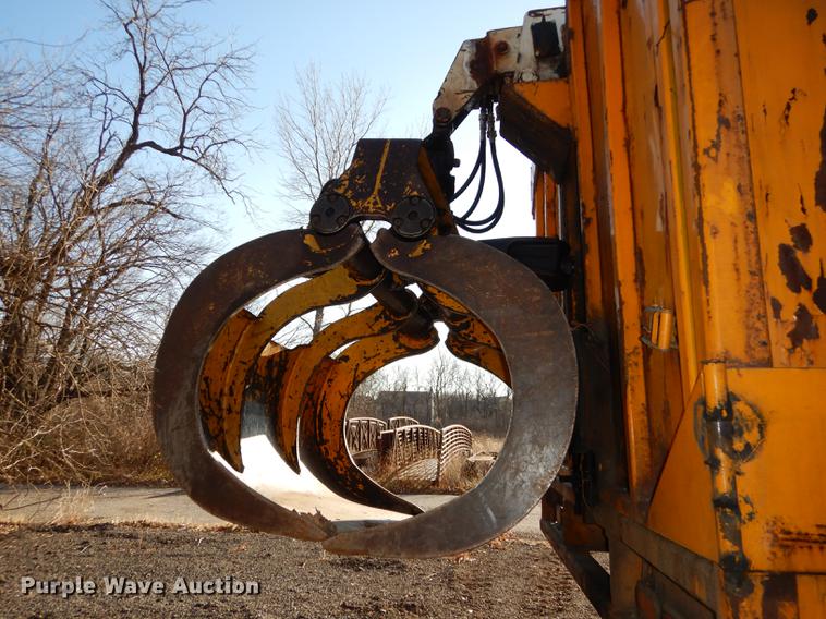 image for item J5564 2002 Sterling L8500 tree grapple truck