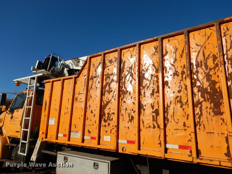 image for item J5564 2002 Sterling L8500 tree grapple truck