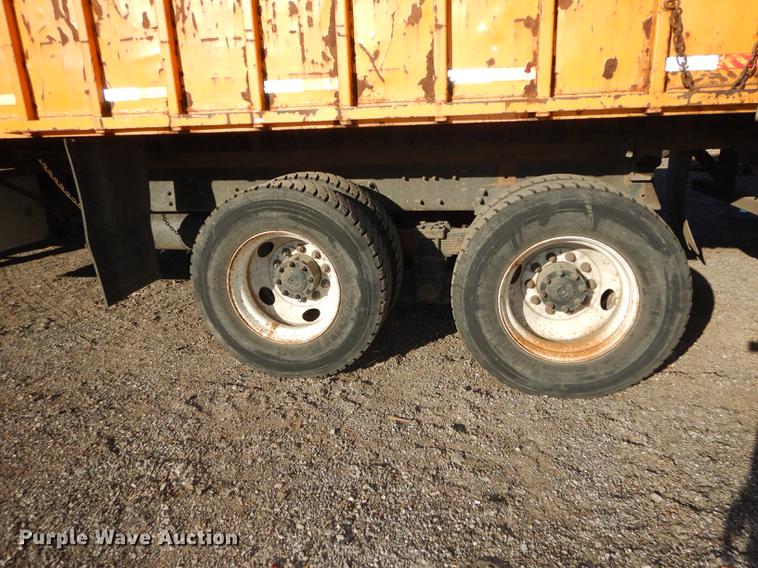 image for item J5564 2002 Sterling L8500 tree grapple truck