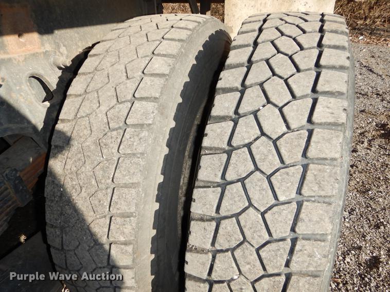 image for item J5564 2002 Sterling L8500 tree grapple truck