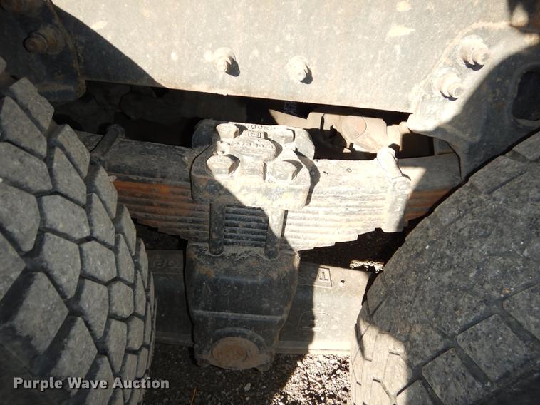 image for item J5564 2002 Sterling L8500 tree grapple truck