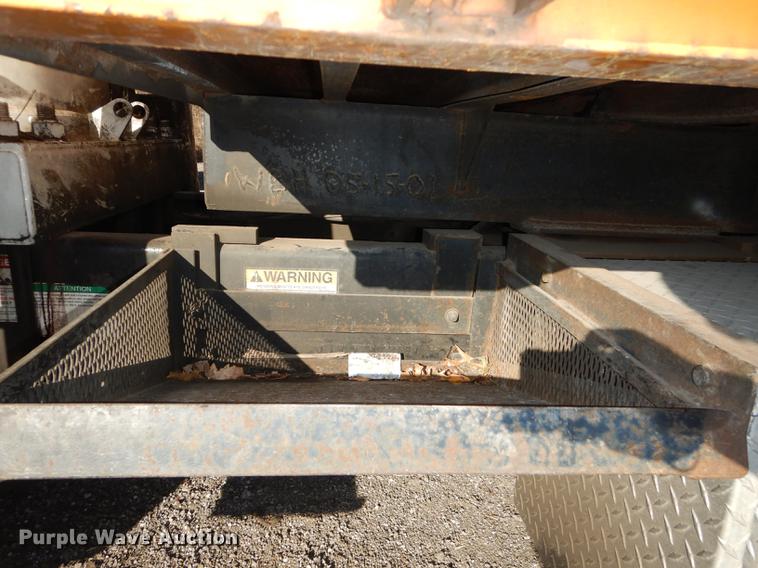 image for item J5564 2002 Sterling L8500 tree grapple truck