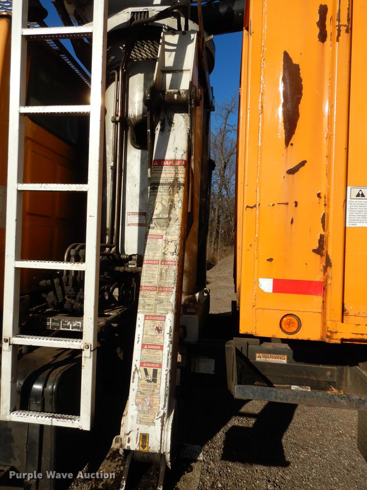 image for item J5564 2002 Sterling L8500 tree grapple truck