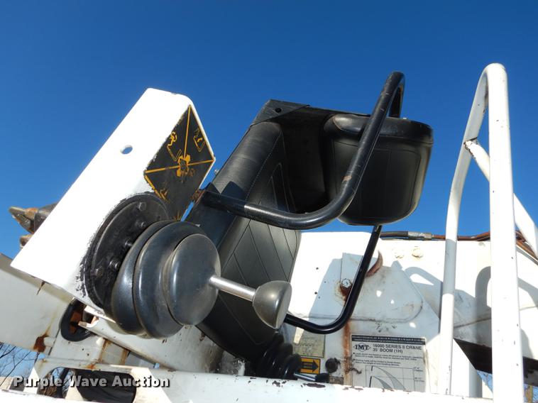 image for item J5564 2002 Sterling L8500 tree grapple truck