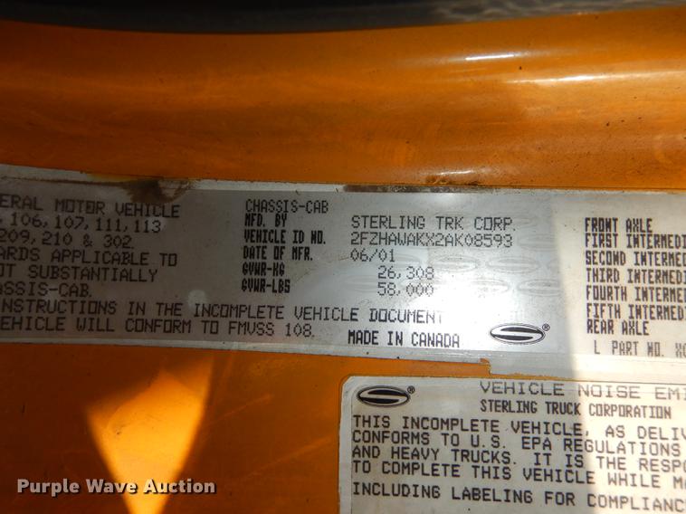 image for item J5564 2002 Sterling L8500 tree grapple truck