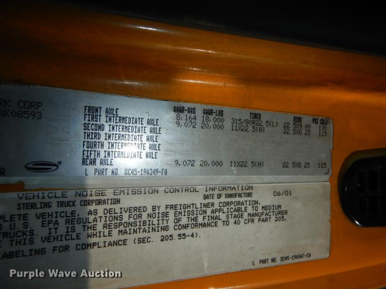 image for item J5564 2002 Sterling L8500 tree grapple truck