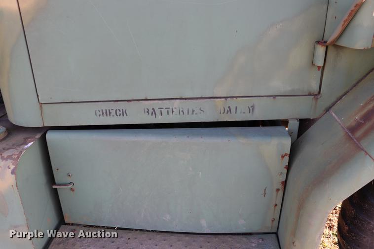 image for item EC9300 1974 Am General flatbed truck