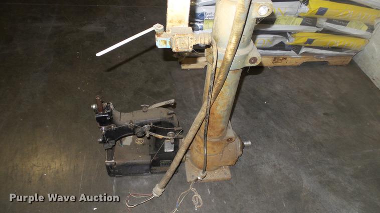 image for item DG9496 Bag sewing head with stand