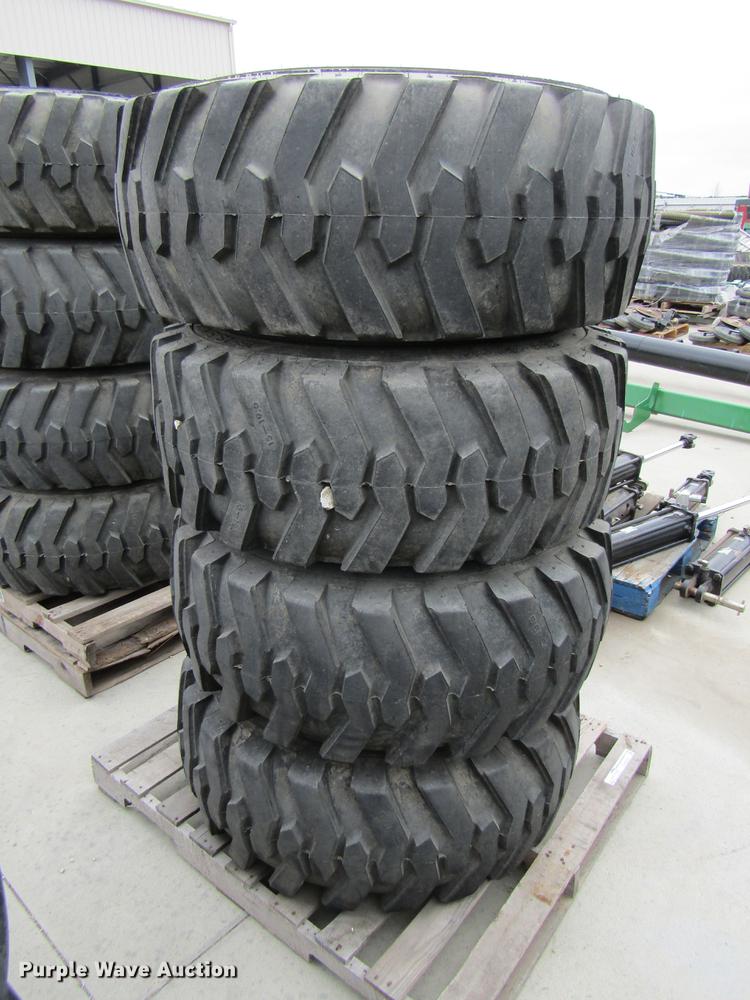 image for item EH9535 (4) Titan 15-19.5 tires