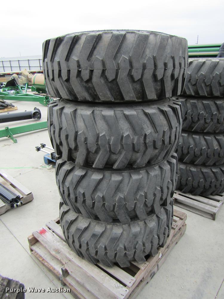 image for item EH9536 (4) Titan 15-19.5 tires