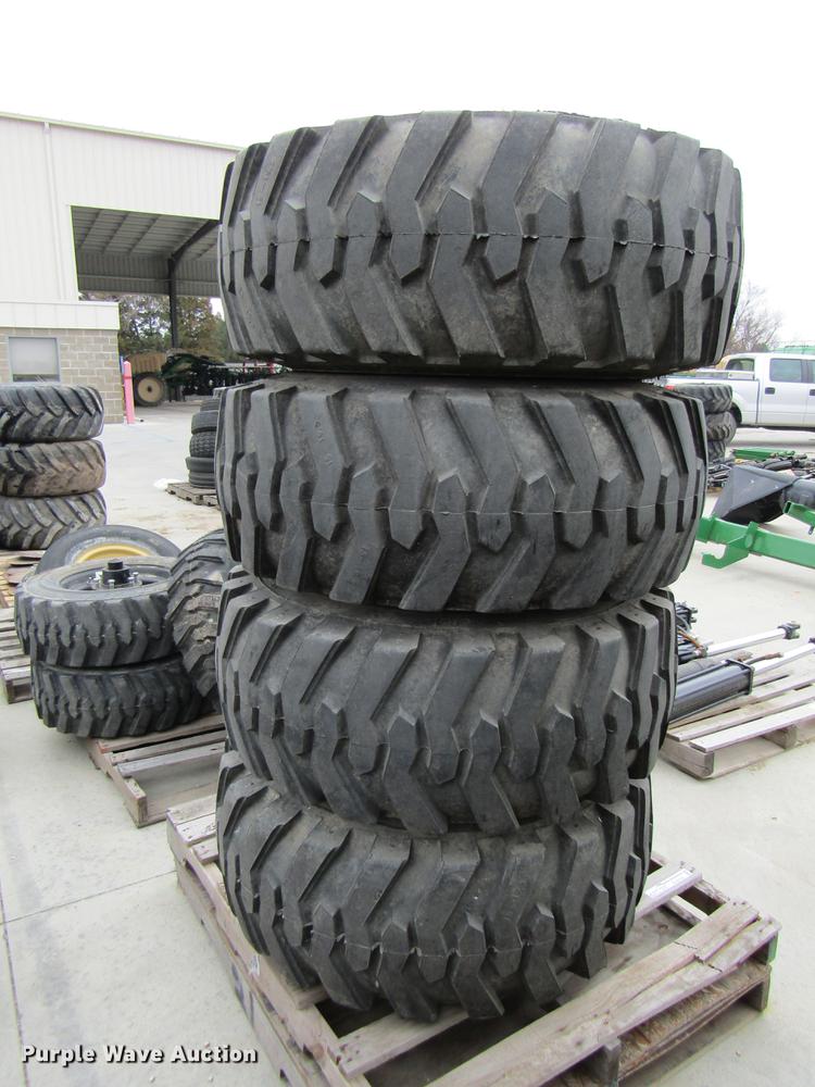 image for item EH9536 (4) Titan 15-19.5 tires