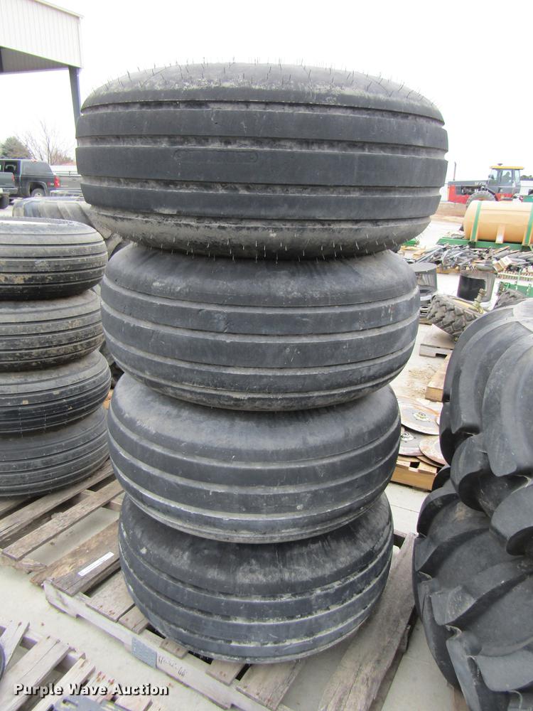 image for item EH9542 (4) Goodyear 16.5L-16.1 tires with 8 bolt wheels