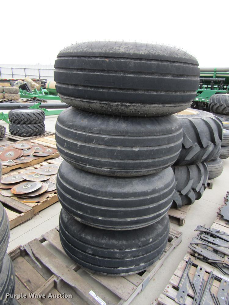 image for item EH9542 (4) Goodyear 16.5L-16.1 tires with 8 bolt wheels