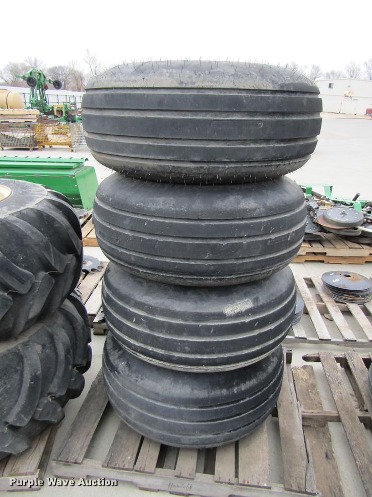 image for item EH9542 (4) Goodyear 16.5L-16.1 tires with 8 bolt wheels