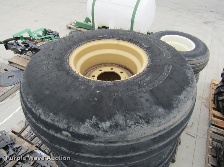 image for item EH9542 (4) Goodyear 16.5L-16.1 tires with 8 bolt wheels