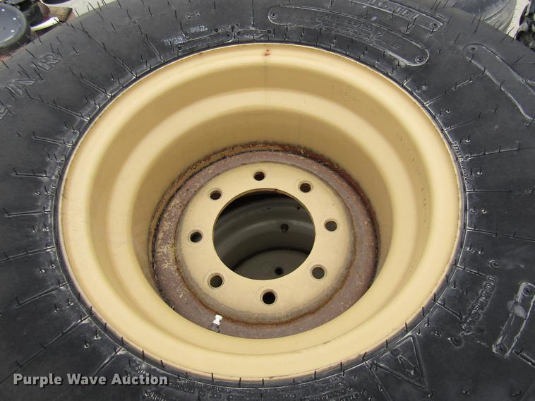 image for item EH9542 (4) Goodyear 16.5L-16.1 tires with 8 bolt wheels