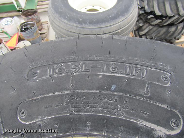 image for item EH9542 (4) Goodyear 16.5L-16.1 tires with 8 bolt wheels