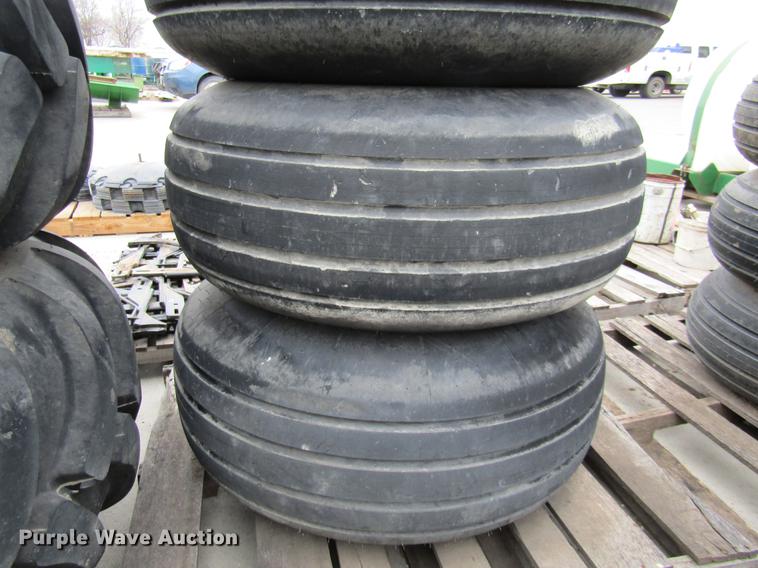 image for item EH9542 (4) Goodyear 16.5L-16.1 tires with 8 bolt wheels