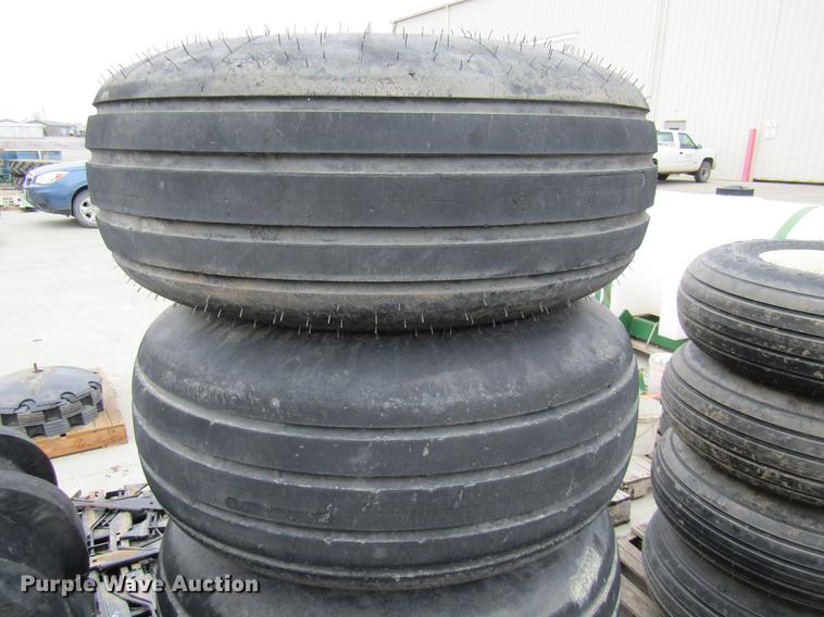 image for item EH9542 (4) Goodyear 16.5L-16.1 tires with 8 bolt wheels