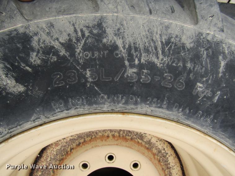 image for item EH9543 (2) Titan 23.5L/55-26 tires with 10 bolt wheels