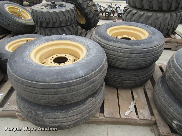image for item EH9545 (4) BKT 11L-15 tires with six bolt wheels