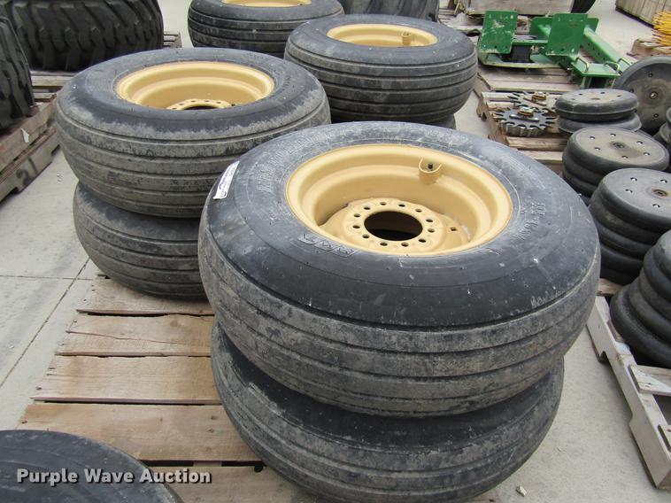 image for item EH9545 (4) BKT 11L-15 tires with six bolt wheels