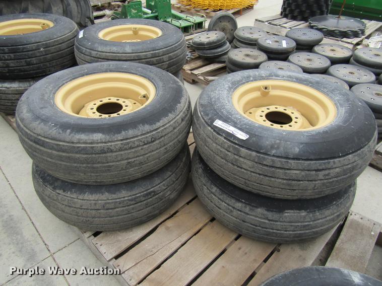 image for item EH9545 (4) BKT 11L-15 tires with six bolt wheels