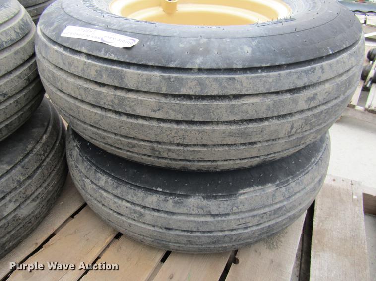 image for item EH9545 (4) BKT 11L-15 tires with six bolt wheels