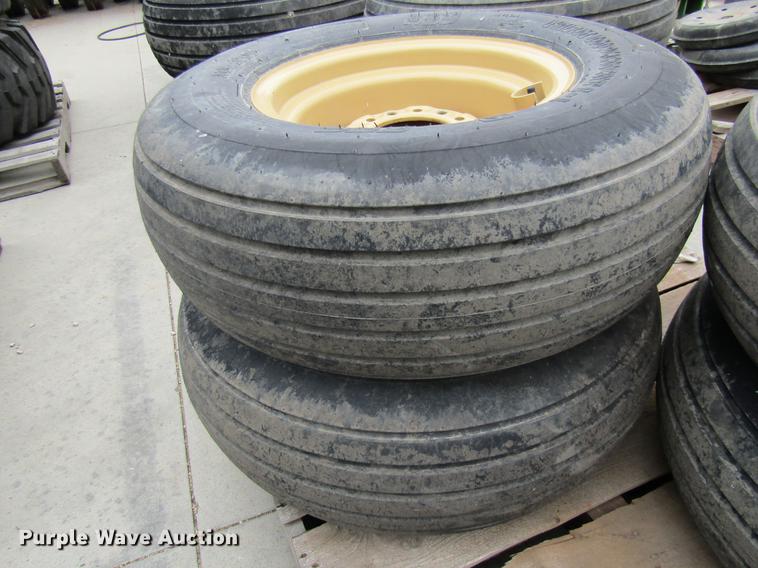 image for item EH9545 (4) BKT 11L-15 tires with six bolt wheels