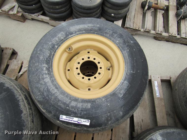 image for item EH9545 (4) BKT 11L-15 tires with six bolt wheels