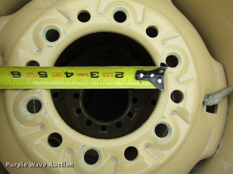 image for item EH9545 (4) BKT 11L-15 tires with six bolt wheels