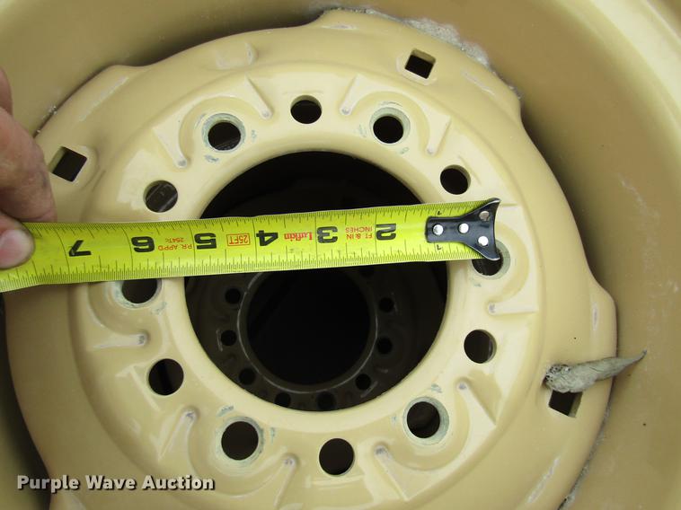 image for item EH9545 (4) BKT 11L-15 tires with six bolt wheels