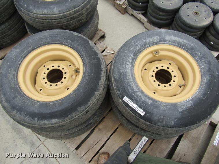 image for item EH9545 (4) BKT 11L-15 tires with six bolt wheels