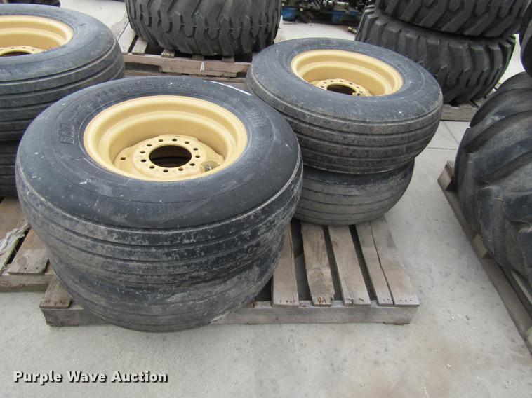 image for item EH9546 (4) BKT 11L-15 tires with six bolt wheels