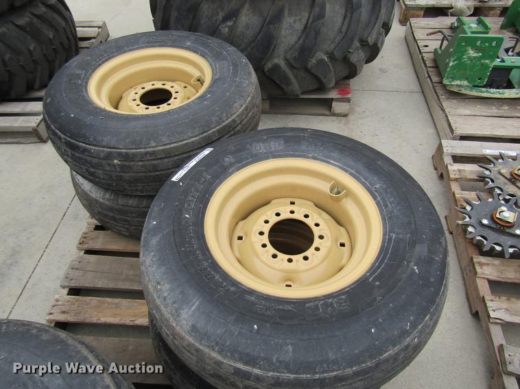 image for item EH9546 (4) BKT 11L-15 tires with six bolt wheels