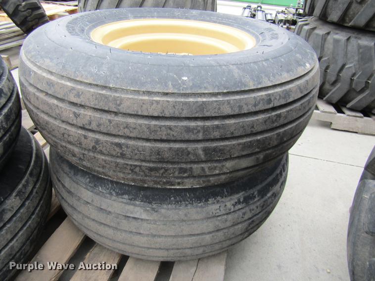 image for item EH9546 (4) BKT 11L-15 tires with six bolt wheels