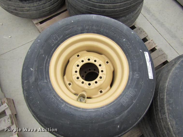 image for item EH9546 (4) BKT 11L-15 tires with six bolt wheels