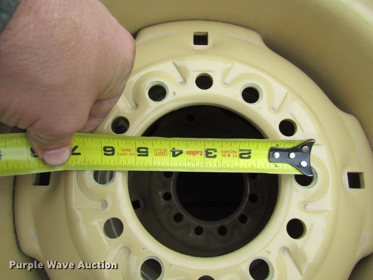 image for item EH9546 (4) BKT 11L-15 tires with six bolt wheels