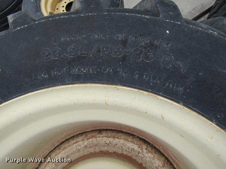 image for item EH9547 (2) Titan 23.5L/55-26 tires with 10 bolt wheels
