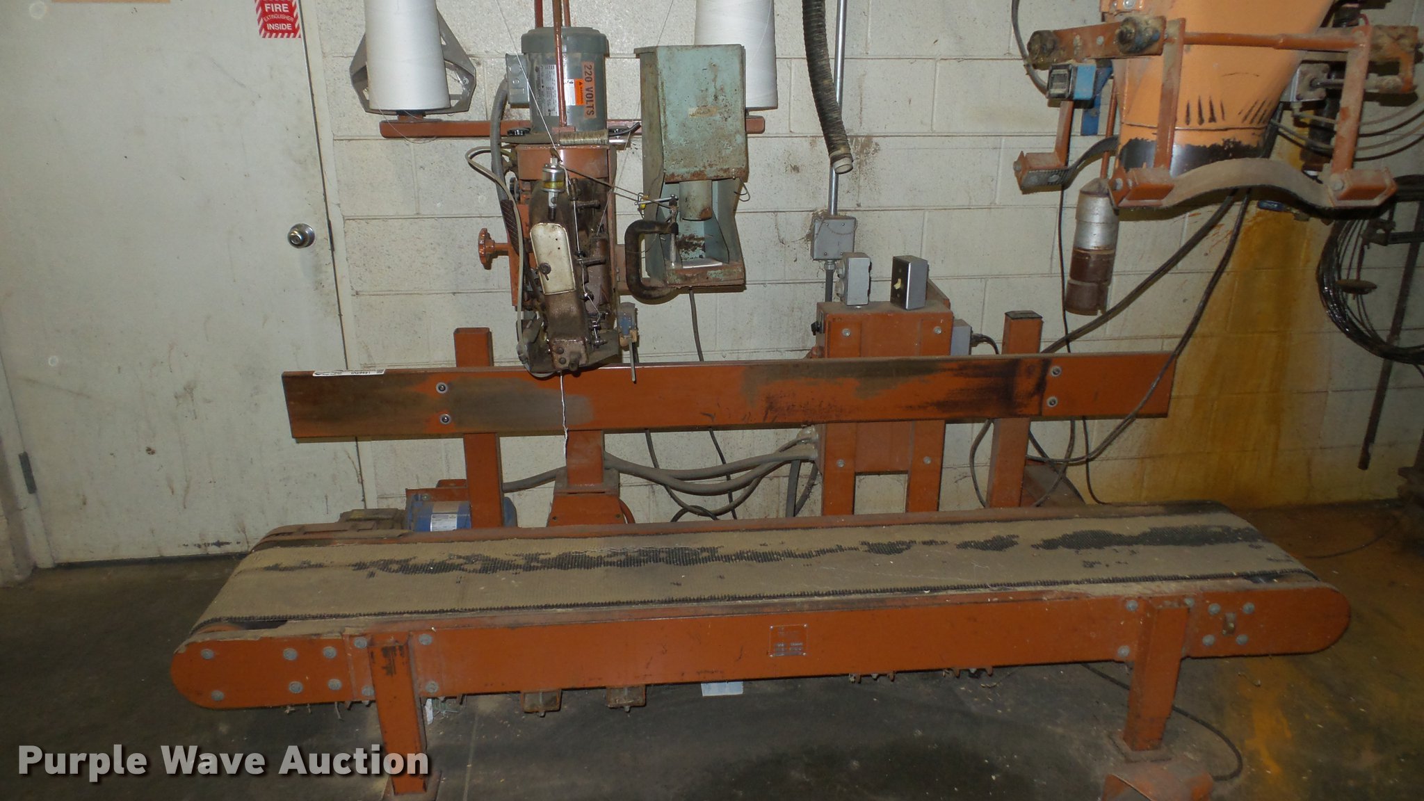 Express Scale Parts 908 conveyor with bag sewing head in Lexington, KY