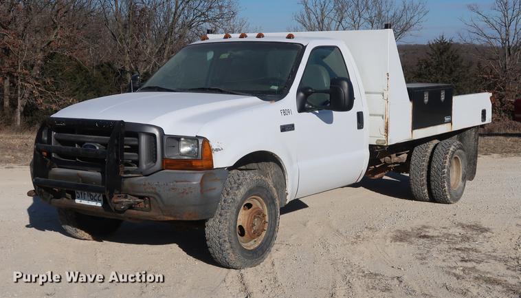 image for item DD9552 2000 Ford F350 Super Duty flatbed pickup truck