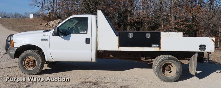image for item DD9552 2000 Ford F350 Super Duty flatbed pickup truck