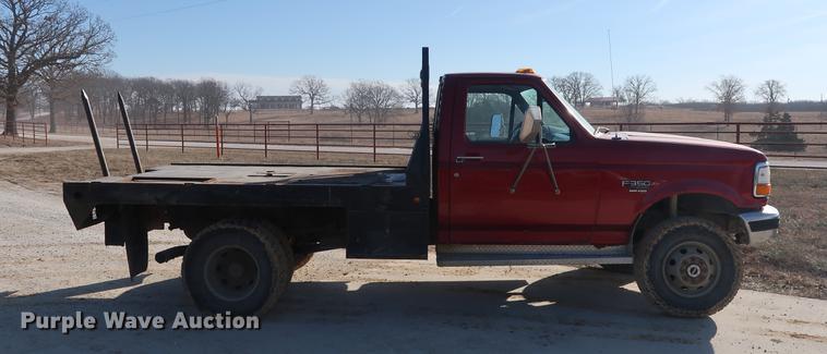 image for item DD9557 1997 Ford F350 flatbed pickup truck