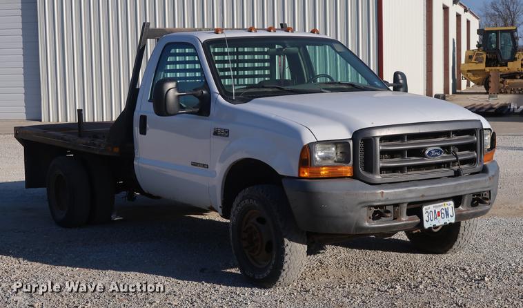 image for item DD9560 2000 Ford F350 Super Duty flatbed pickup truck