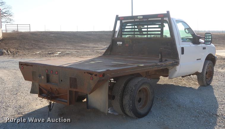 image for item DD9560 2000 Ford F350 Super Duty flatbed pickup truck
