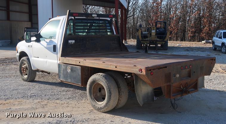 image for item DD9560 2000 Ford F350 Super Duty flatbed pickup truck