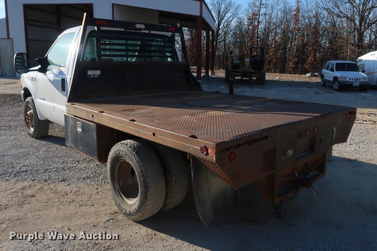 image for item DD9560 2000 Ford F350 Super Duty flatbed pickup truck